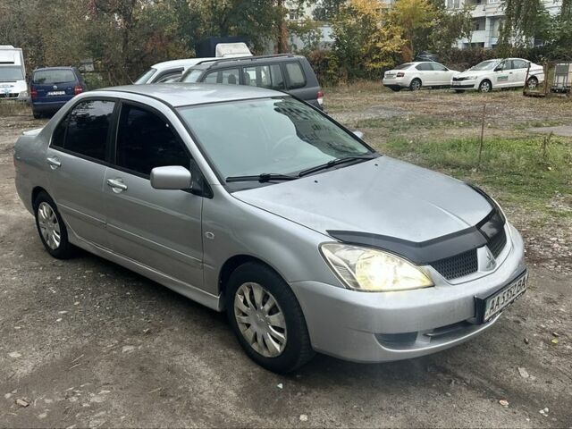 Мицубиси Лансер 2005 в Киеве на Automoto.ua Серый Мицубиси Лансер, объемом двигателя 1.6 л и пробегом 340 тыс. км за 2499 $, фото 1 на Automoto.ua
