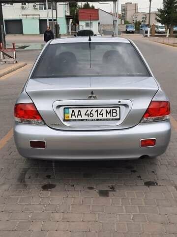 Серый Мицубиси Лансер, объемом двигателя 1.6 л и пробегом 277 тыс. км за 3500 $, фото 1 на Automoto.ua