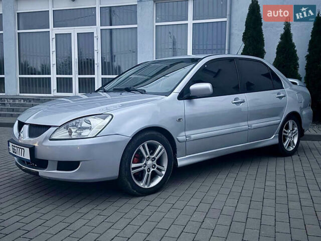 Сірий Міцубісі Lancer, об'ємом двигуна 2 л та пробігом 187 тис. км за 4600 $, фото 1 на Automoto.ua