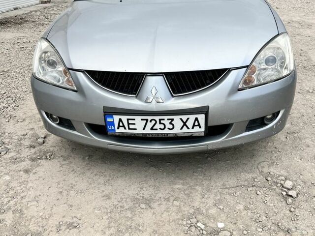 Серый Мицубиси Лансер, объемом двигателя 1.6 л и пробегом 250 тыс. км за 3500 $, фото 1 на Automoto.ua