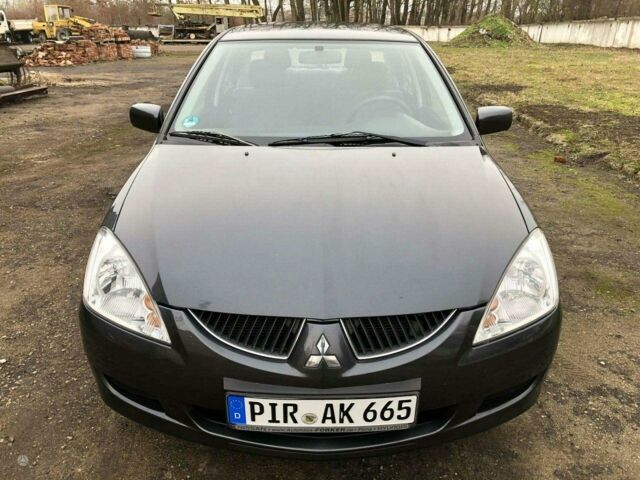 Сірий Міцубісі Lancer, об'ємом двигуна 1.8 л та пробігом 150 тис. км за 1700 $, фото 1 на Automoto.ua