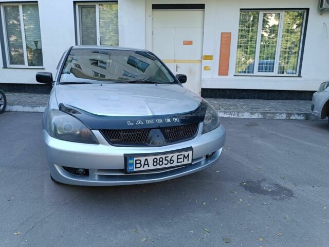 Сірий Міцубісі Lancer, об'ємом двигуна 1.6 л та пробігом 243 тис. км за 3551 $, фото 1 на Automoto.ua