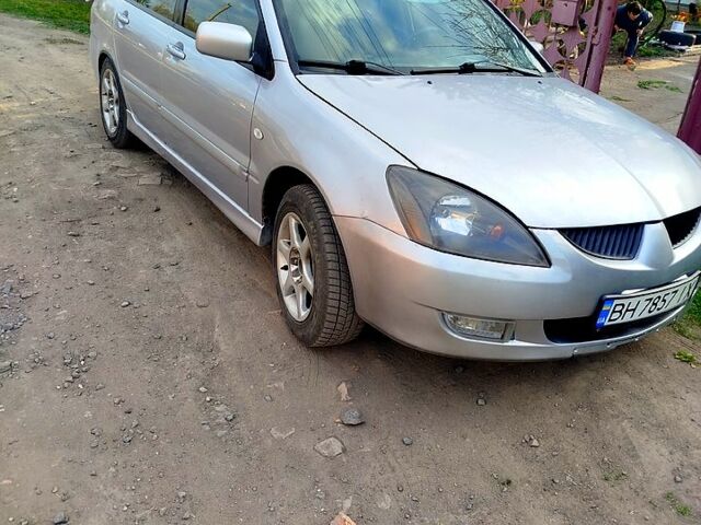 Серый Мицубиси Лансер, объемом двигателя 1.6 л и пробегом 190 тыс. км за 3300 $, фото 1 на Automoto.ua