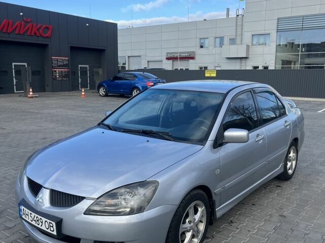 Сірий Міцубісі Lancer, об'ємом двигуна 2 л та пробігом 200 тис. км за 3750 $, фото 1 на Automoto.ua