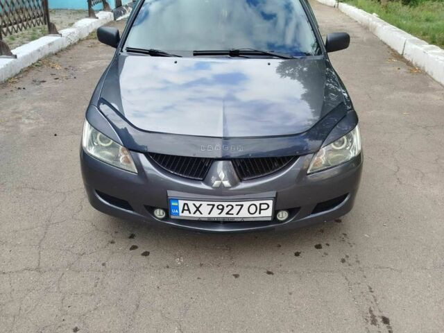 Сірий Міцубісі Lancer, об'ємом двигуна 1.6 л та пробігом 250 тис. км за 5000 $, фото 1 на Automoto.ua