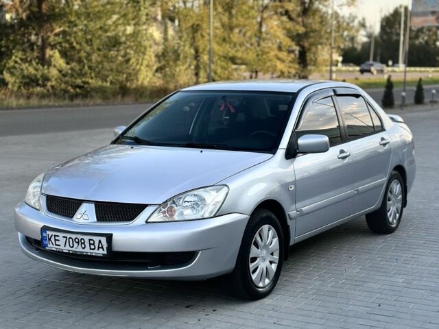 Серый Мицубиси Лансер, объемом двигателя 1.6 л и пробегом 170 тыс. км за 3512 $, фото 1 на Automoto.ua