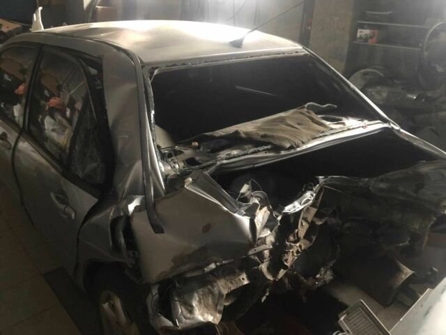 Серый Мицубиси Лансер, объемом двигателя 1.6 л и пробегом 241 тыс. км за 1500 $, фото 1 на Automoto.ua