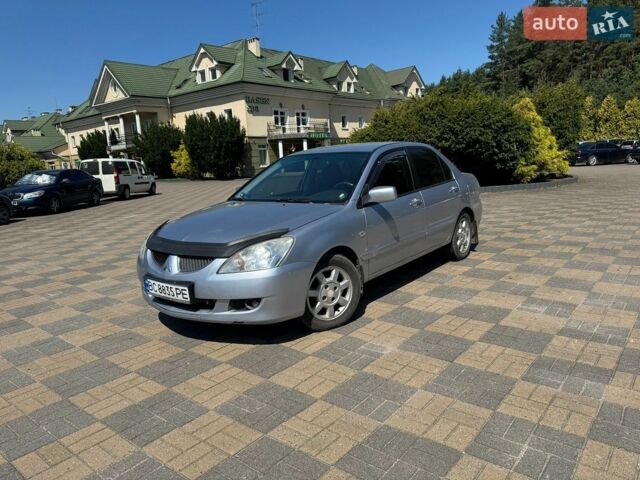 Сірий Міцубісі Lancer, об'ємом двигуна 1.6 л та пробігом 295 тис. км за 2800 $, фото 1 на Automoto.ua