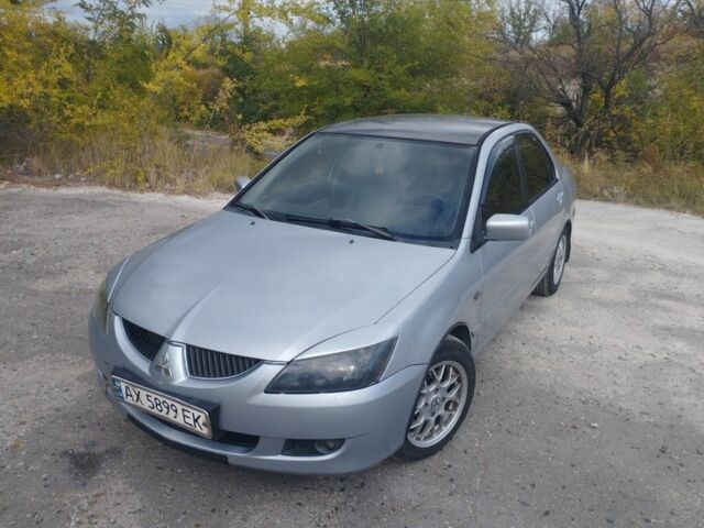 Сірий Міцубісі Lancer, об'ємом двигуна 1.6 л та пробігом 244 тис. км за 3300 $, фото 1 на Automoto.ua