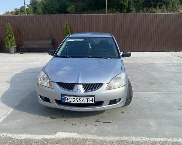 Сірий Міцубісі Lancer, об'ємом двигуна 1.6 л та пробігом 264 тис. км за 3050 $, фото 1 на Automoto.ua