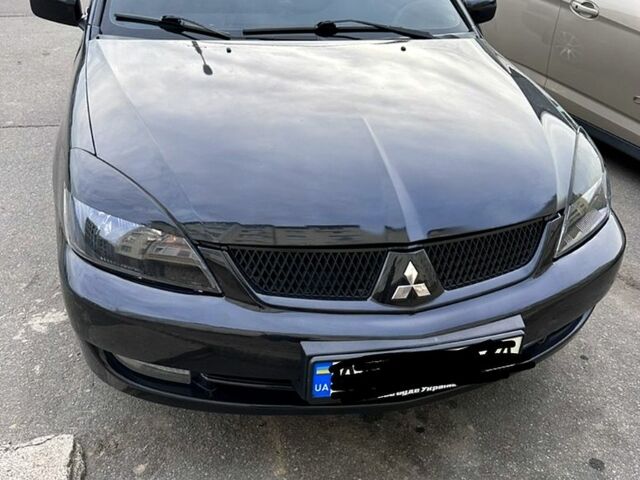 Сірий Міцубісі Lancer, об'ємом двигуна 2 л та пробігом 0 тис. км за 4000 $, фото 1 на Automoto.ua