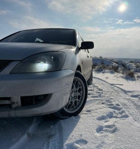 Серый Мицубиси Лансер, объемом двигателя 1.58 л и пробегом 250 тыс. км за 2900 $, фото 1 на Automoto.ua