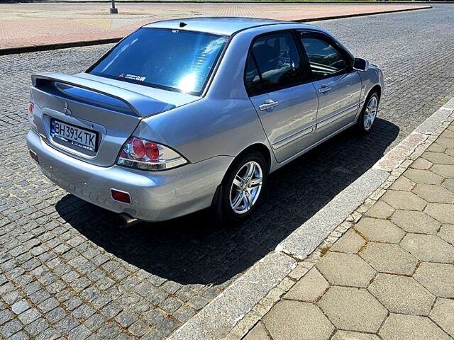 Сірий Міцубісі Lancer, об'ємом двигуна 2 л та пробігом 278 тис. км за 3200 $, фото 1 на Automoto.ua