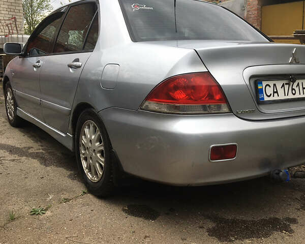 Сірий Міцубісі Lancer, об'ємом двигуна 1.6 л та пробігом 300 тис. км за 3800 $, фото 1 на Automoto.ua