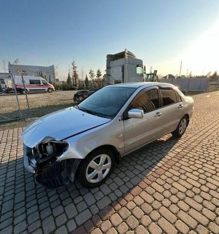 Серый Мицубиси Лансер, объемом двигателя 1.58 л и пробегом 303 тыс. км за 2500 $, фото 1 на Automoto.ua