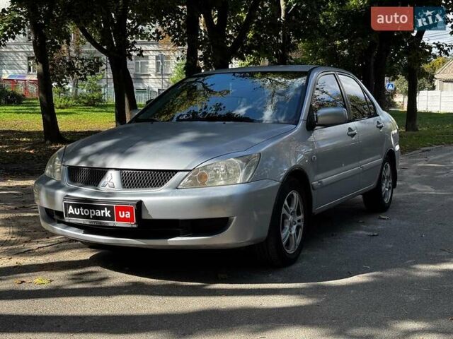 Серый Мицубиси Лансер, объемом двигателя 1.6 л и пробегом 196 тыс. км за 4490 $, фото 1 на Automoto.ua