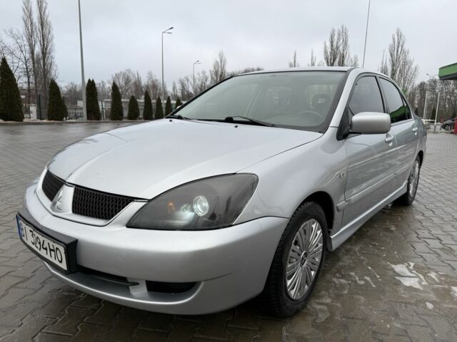 Серый Мицубиси Лансер, объемом двигателя 1.6 л и пробегом 208 тыс. км за 4300 $, фото 1 на Automoto.ua