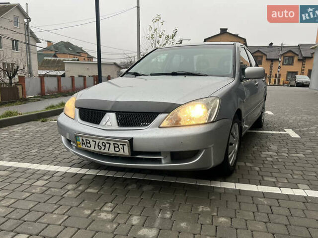 Сірий Міцубісі Lancer, об'ємом двигуна 1.58 л та пробігом 333 тис. км за 2450 $, фото 1 на Automoto.ua