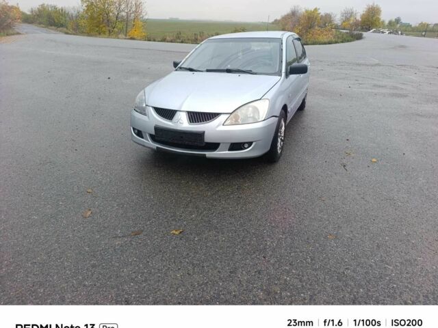 Сірий Міцубісі Lancer, об'ємом двигуна 0 л та пробігом 312 тис. км за 998 $, фото 1 на Automoto.ua