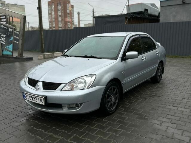 Сірий Міцубісі Lancer, об'ємом двигуна 1.6 л та пробігом 230 тис. км за 4500 $, фото 1 на Automoto.ua