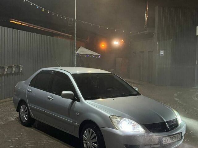 Серый Мицубиси Лансер, объемом двигателя 1.6 л и пробегом 330 тыс. км за 3200 $, фото 1 на Automoto.ua