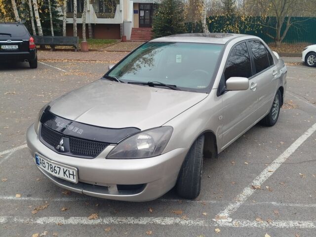 Сірий Міцубісі Lancer, об'ємом двигуна 2 л та пробігом 330 тис. км за 3450 $, фото 1 на Automoto.ua