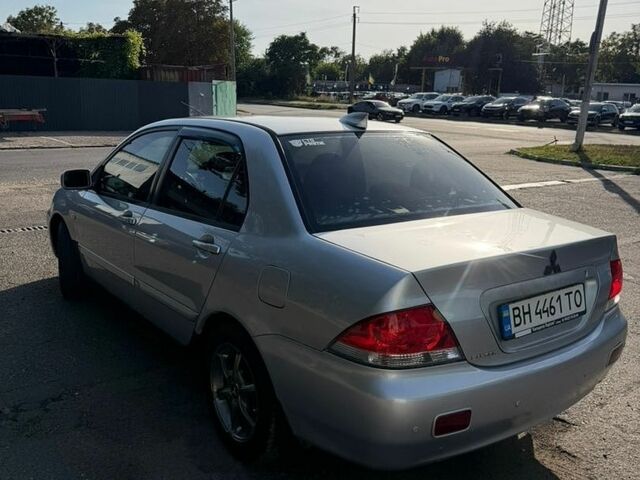 Сірий Міцубісі Lancer, об'ємом двигуна 1.6 л та пробігом 200 тис. км за 3500 $, фото 1 на Automoto.ua