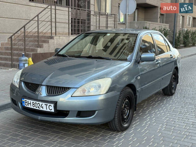 Сірий Міцубісі Lancer, об'ємом двигуна 1.6 л та пробігом 152 тис. км за 3800 $, фото 1 на Automoto.ua