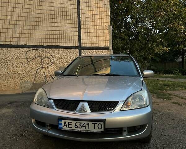 Сірий Міцубісі Lancer, об'ємом двигуна 1.6 л та пробігом 225 тис. км за 4200 $, фото 1 на Automoto.ua