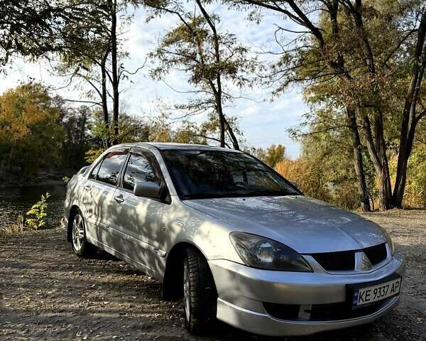 Сірий Міцубісі Lancer, об'ємом двигуна 2 л та пробігом 270 тис. км за 4700 $, фото 1 на Automoto.ua