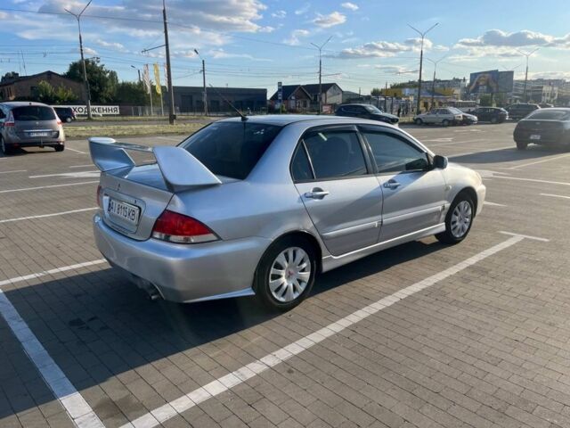 Сірий Міцубісі Lancer, об'ємом двигуна 1.6 л та пробігом 405 тис. км за 2961 $, фото 1 на Automoto.ua