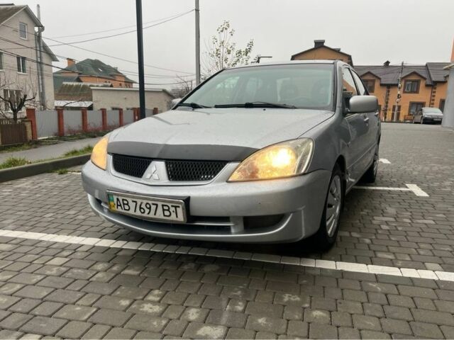Серый Мицубиси Лансер, объемом двигателя 1.6 л и пробегом 333 тыс. км за 2800 $, фото 1 на Automoto.ua