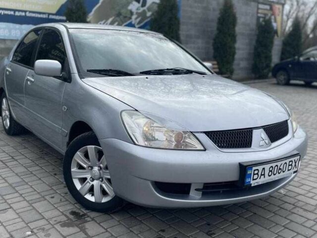 Сірий Міцубісі Lancer, об'ємом двигуна 0.16 л та пробігом 226 тис. км за 5400 $, фото 1 на Automoto.ua