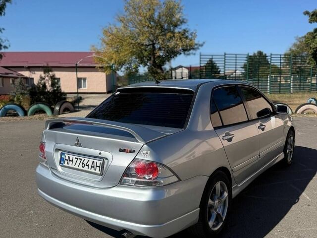 Сірий Міцубісі Lancer, об'ємом двигуна 2 л та пробігом 230 тис. км за 4500 $, фото 1 на Automoto.ua
