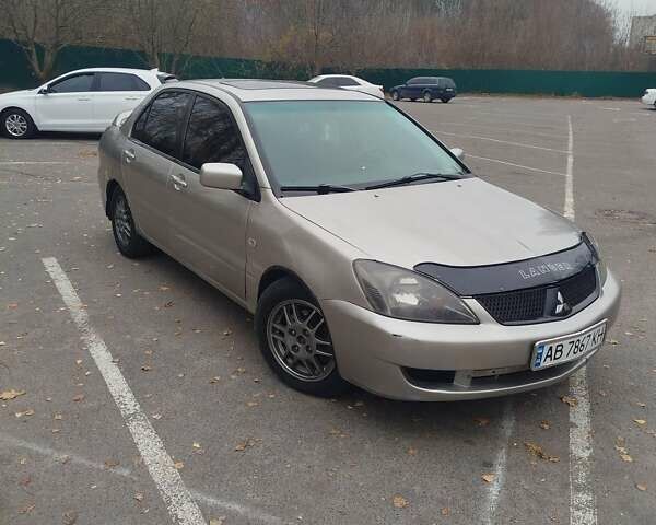 Сірий Міцубісі Lancer, об'ємом двигуна 2 л та пробігом 330 тис. км за 3450 $, фото 1 на Automoto.ua