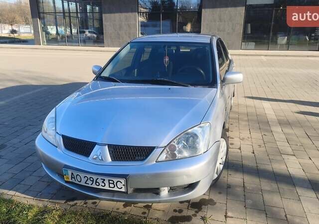 Сірий Міцубісі Lancer, об'ємом двигуна 1.6 л та пробігом 206 тис. км за 3800 $, фото 1 на Automoto.ua