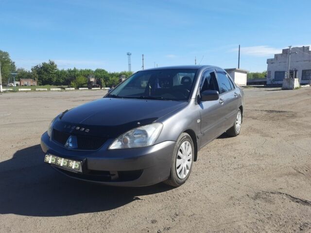 Сірий Міцубісі Lancer, об'ємом двигуна 0 л та пробігом 1 тис. км за 4800 $, фото 1 на Automoto.ua