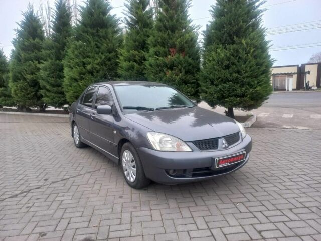 Серый Мицубиси Лансер, объемом двигателя 1.6 л и пробегом 162 тыс. км за 4650 $, фото 1 на Automoto.ua