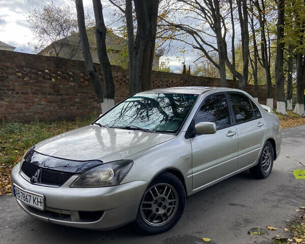 Мицубиси Лансер 2006 в Погребище на Automoto.ua Серый Мицубиси Лансер, объемом двигателя 2 л и пробегом 320 тыс. км за 3300 $, фото 1 на Automoto.ua