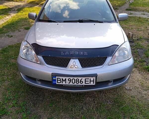 Сірий Міцубісі Lancer, об'ємом двигуна 1.58 л та пробігом 280 тис. км за 3900 $, фото 1 на Automoto.ua