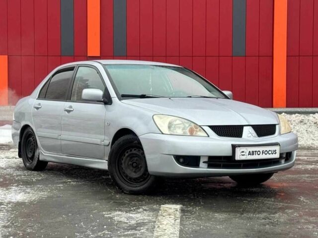 Сірий Міцубісі Lancer, об'ємом двигуна 1.6 л та пробігом 263 тис. км за 4190 $, фото 1 на Automoto.ua