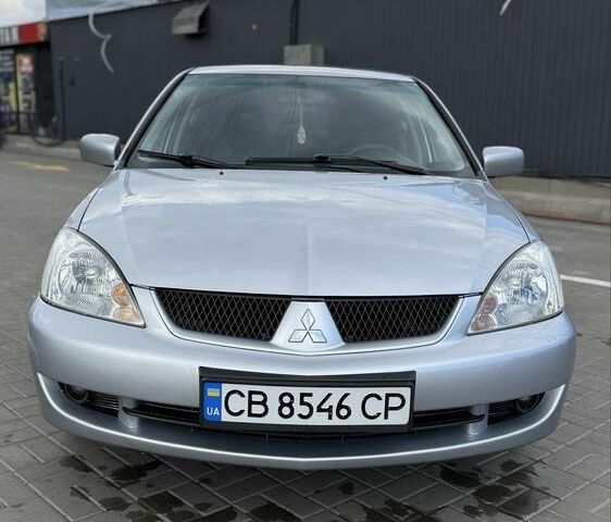 Сірий Міцубісі Lancer, об'ємом двигуна 1.6 л та пробігом 265 тис. км за 3750 $, фото 1 на Automoto.ua