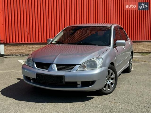 Серый Мицубиси Лансер, объемом двигателя 0 л и пробегом 182 тыс. км за 6500 $, фото 1 на Automoto.ua