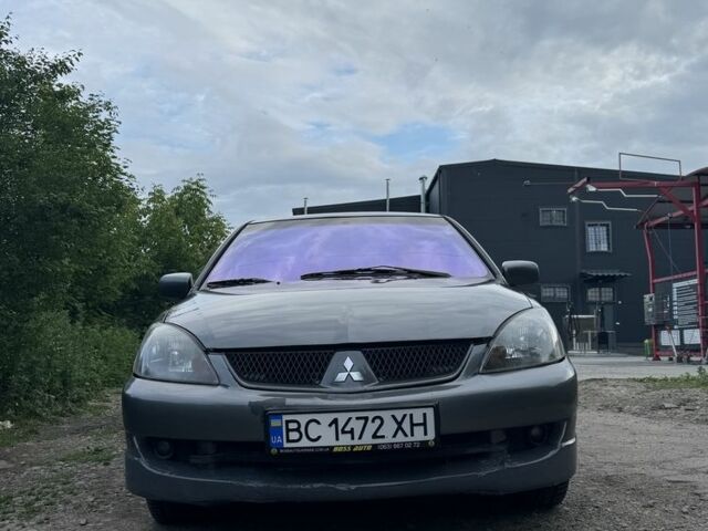 Сірий Міцубісі Lancer, об'ємом двигуна 2 л та пробігом 244 тис. км за 2716 $, фото 1 на Automoto.ua