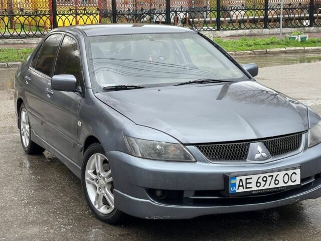 Серый Мицубиси Лансер, объемом двигателя 0 л и пробегом 245 тыс. км за 3500 $, фото 1 на Automoto.ua