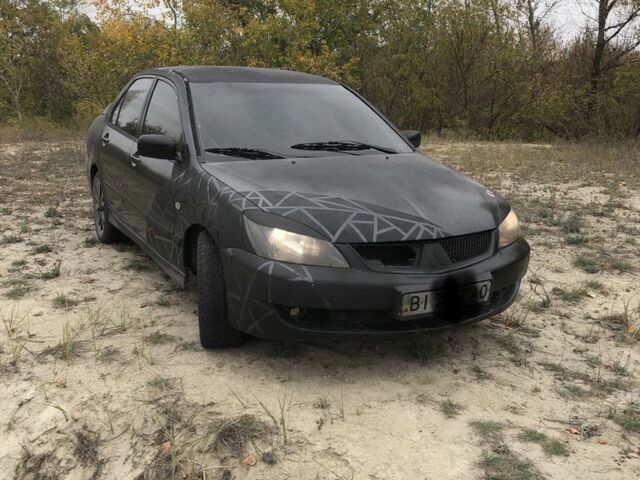 Міцубісі Lancer 2006 у Синельниковом на Automoto.ua Сірий Міцубісі Lancer, об'ємом двигуна 2 л та пробігом 200 тис. км за 3000 $, фото 1 на Automoto.ua