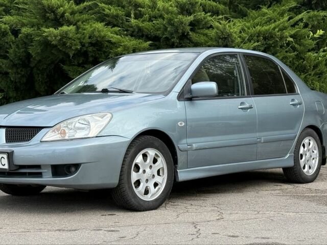 Серый Мицубиси Лансер, объемом двигателя 1.6 л и пробегом 220 тыс. км за 4400 $, фото 1 на Automoto.ua