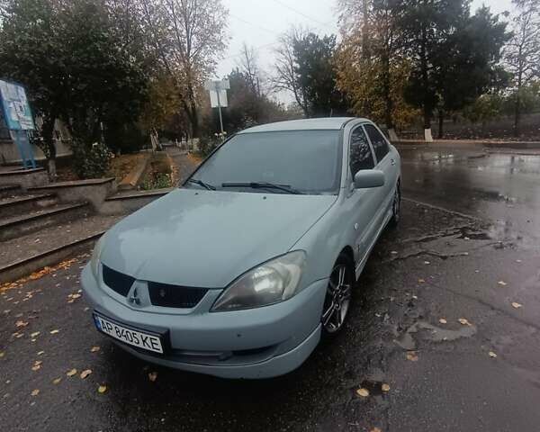 Сірий Міцубісі Lancer, об'ємом двигуна 2 л та пробігом 263 тис. км за 4300 $, фото 1 на Automoto.ua