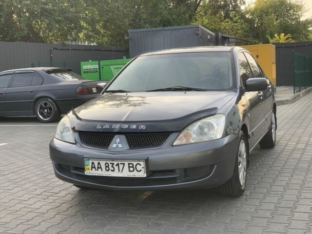 Сірий Міцубісі Lancer, об'ємом двигуна 1.6 л та пробігом 270 тис. км за 3800 $, фото 1 на Automoto.ua