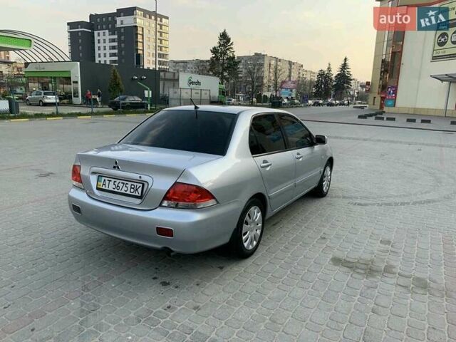 Сірий Міцубісі Lancer, об'ємом двигуна 2 л та пробігом 199 тис. км за 4400 $, фото 1 на Automoto.ua